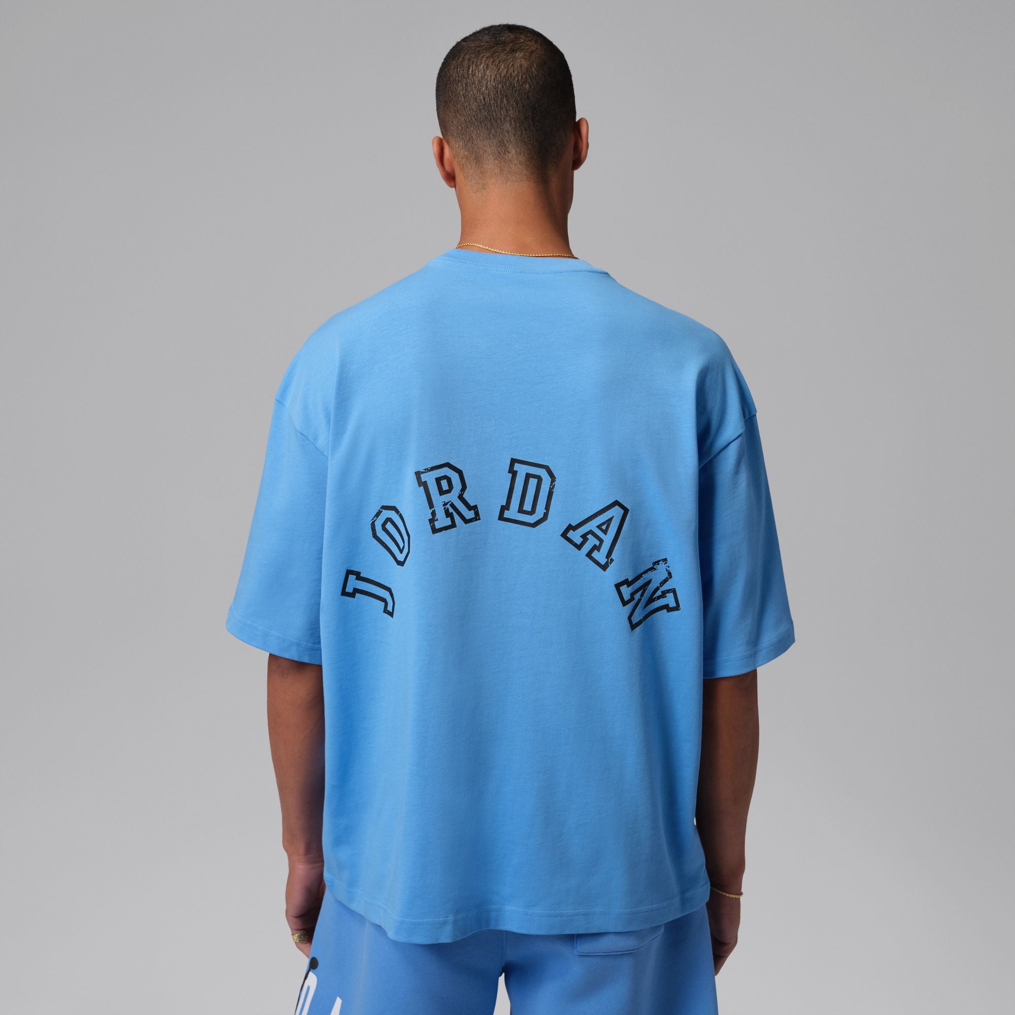 MENS JORDAN OVERSIZE SS CREW LA GR (UNIVERSITY BLUE/BLACK)