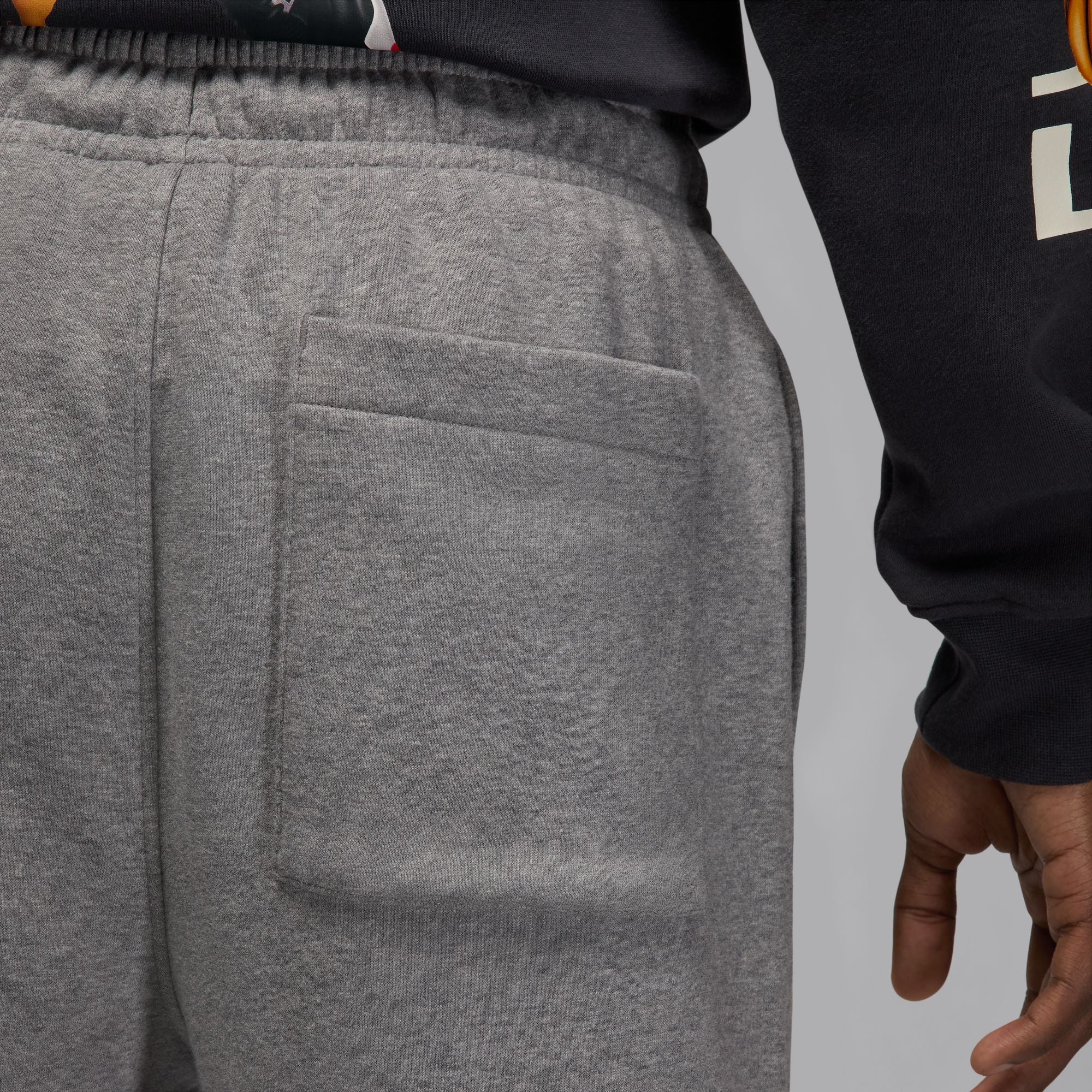 MENS JORDAN BROOKLYN FLEECE PANT (CARBON HEATHER/WHITE)