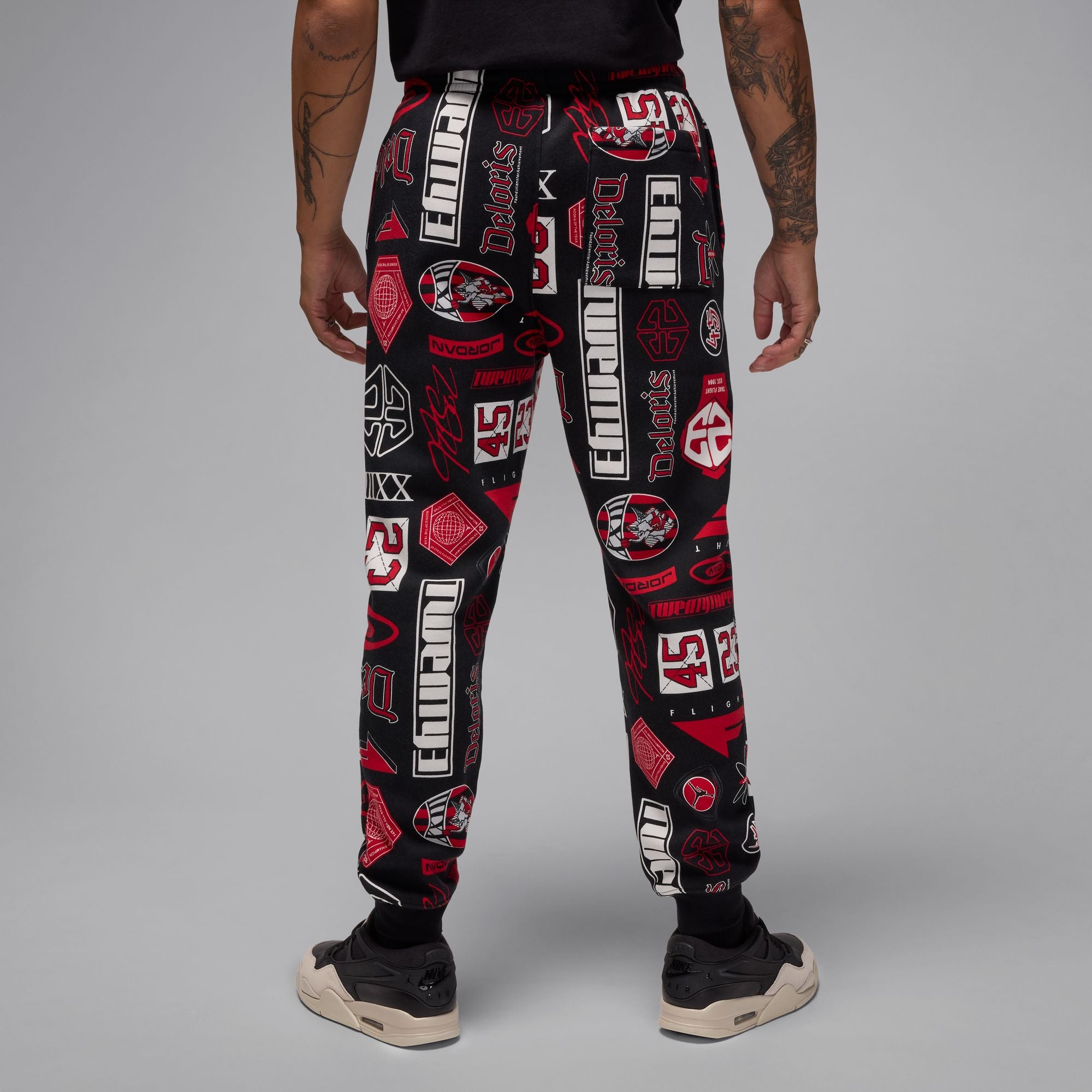 MENS JORDAN AOP FLEECE PANT (BLACK/VARSITY RED)