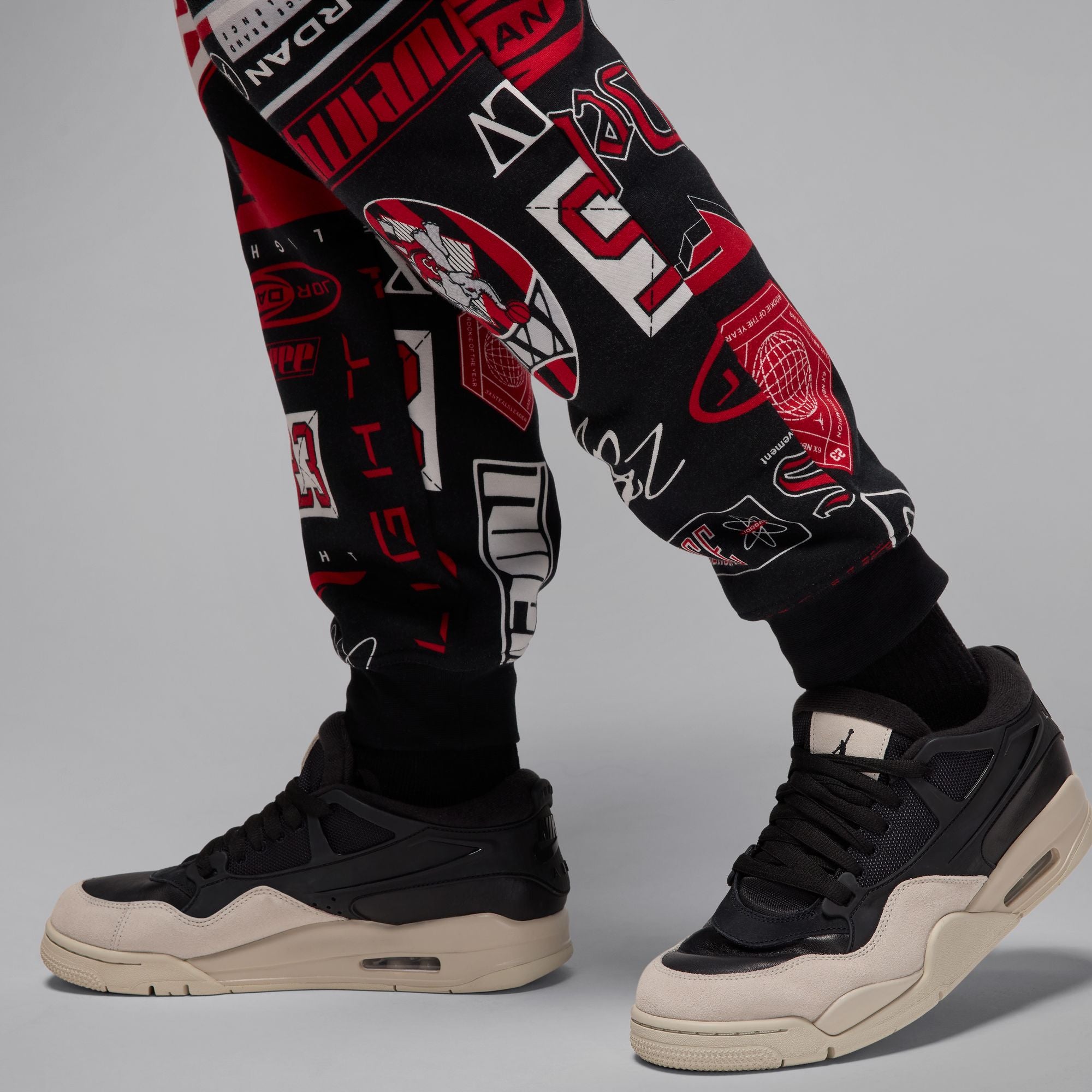 MENS JORDAN AOP FLEECE PANT (BLACK/VARSITY RED)