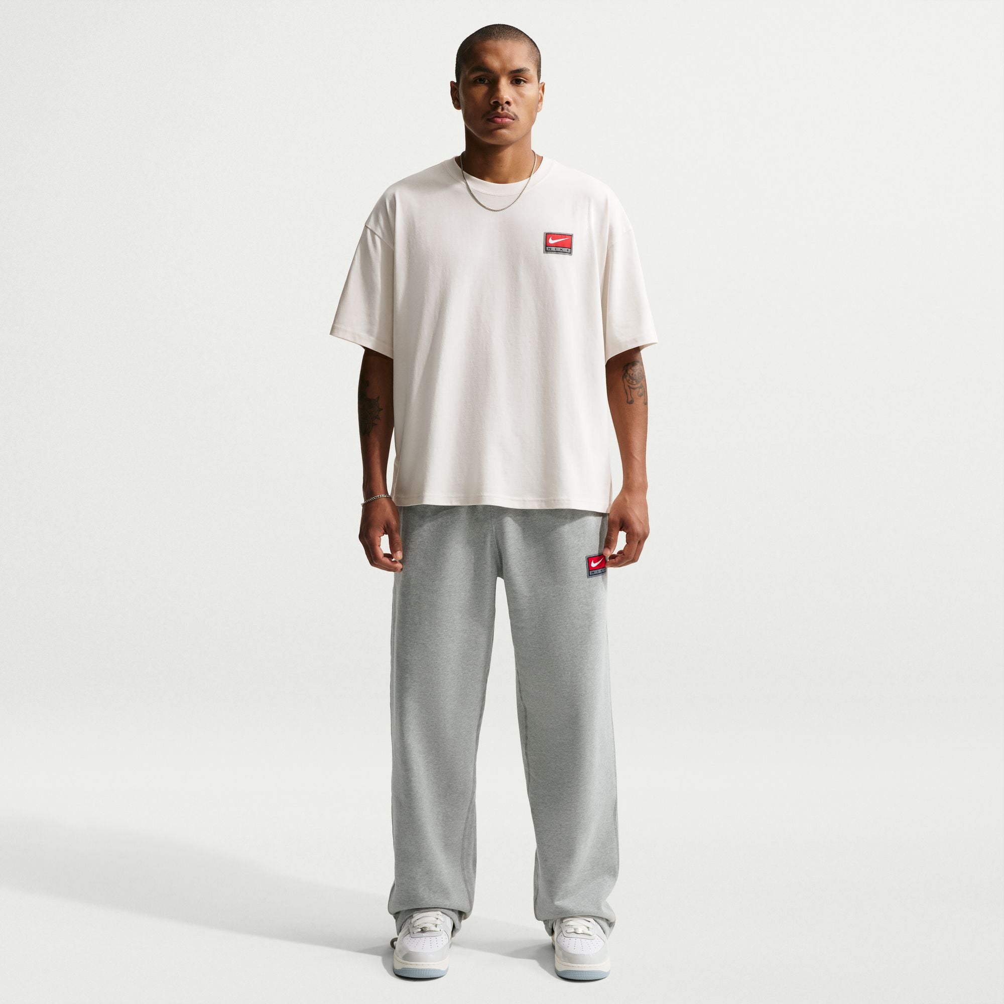 MENS NIK NL SOLO SWSH BB OH PANT GFX (DK GREY HEATHER/WHITE)
