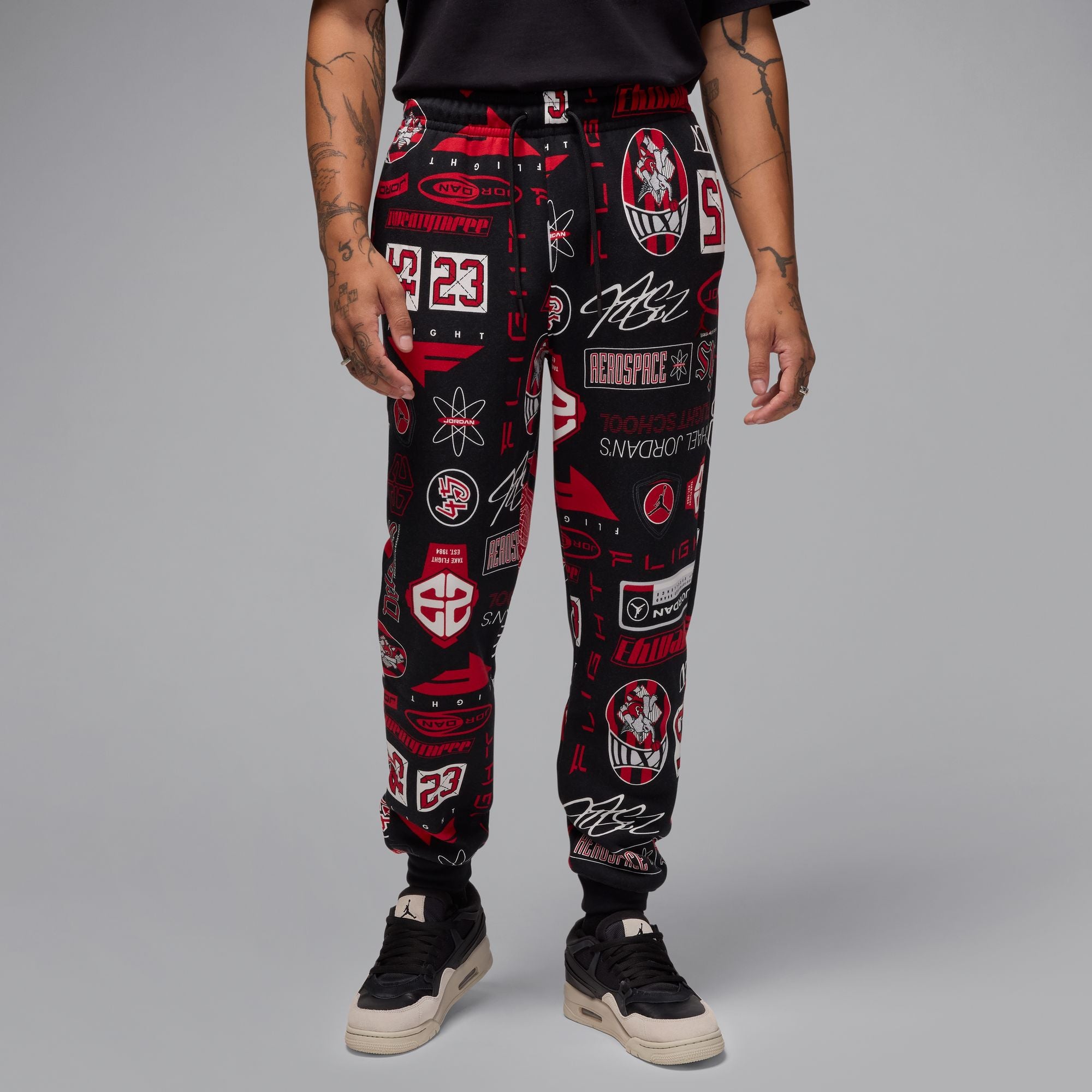 MENS JORDAN AOP FLEECE PANT (BLACK/VARSITY RED)